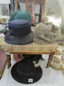 A quantity of hats including vintage