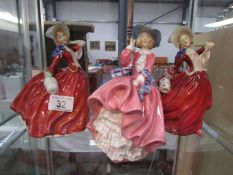 3 Royal Doulton figurines being 2 'Autumn Breezes' and 1 'Top o' the Hill'