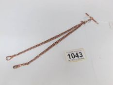 A 9ct rose gold Albert chain,