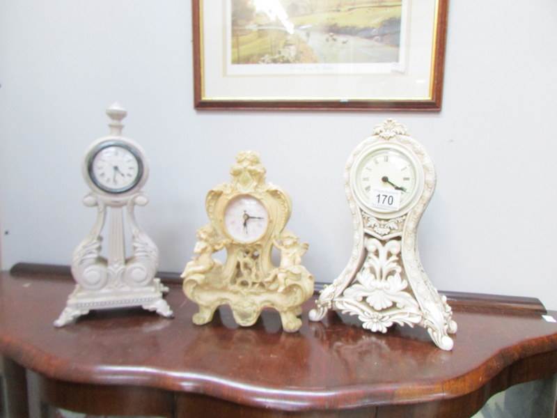 3 ornate mantel clocks