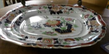 An Ashworth ironstone china meat platter, flying bird pattern,