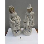 A pair of 19th century bisque figures