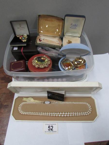 A mixed lot of costume jewellery including cuff links, brooches,
