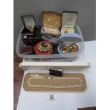 A mixed lot of costume jewellery including cuff links, brooches,