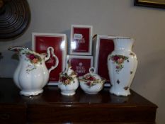 4 boxed Royal Albert Old Country roses items being, jug, vase,