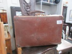 A small vintage suitcase