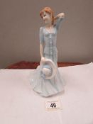 A Royal Doulton figurine,