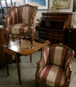A pair of 19th century mahogany framed arm chairs