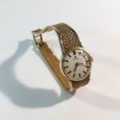 A ladies Omega 9ct gold wrist watch