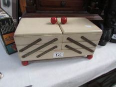 A small concertina sewing box