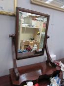 A mahogany toilet mirror