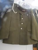 A military dress tunic and cap