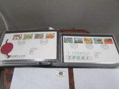 An album of 58 UK first day covers 1984-89