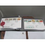 An album of 58 UK first day covers 1984-89