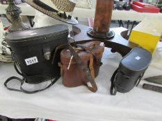 A pair of Barr & Stroud binoculars and 2 others