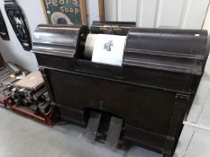 A rare 19th century parlour pianola (sits in front of a piano) with a large quantity of music rolls