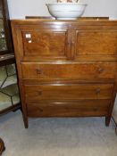 An Edwardian walnut cabinet with top cupboard and 3 drawers