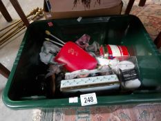 A box of assorted needle craft items