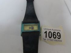 An Ingersol digital Swiss watch