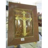 A large framed and glazed 19th century Crucifix with concaved glass