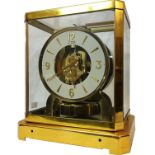 A Le Coultre brass carriage clock (2 holes in front where presentation plaque sat)
