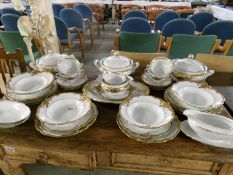 26 pieces of gold edged dinner ware