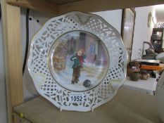 An Edwardian hand painted plate signed E R Booth