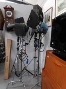 4 large studio/film lights on stands