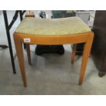 A dressing table stool