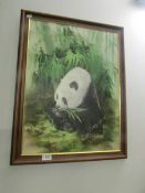 A Krit Choy oil on board of a panda with bamboo