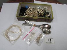 A mixed lot including 2 silver spoons,