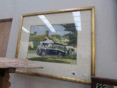 A framed and glazed print of a Cornish bus