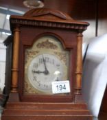 An oak mantel clock