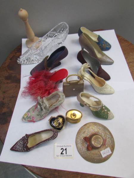 A collection of miniature model shoes etc