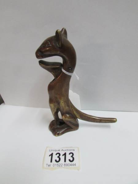 An antique bronze nutcracker fashioned as a cat