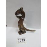 An antique bronze nutcracker fashioned as a cat