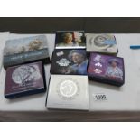 7 cased silver GB anniversary and memorial crowns