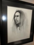 A signed framed and glazed portrait print of Bob Marley