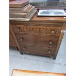 An oak Priory style 3 drawer chest