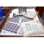 A quantity of penny red stamps and Elizabeth II blocks and sheets