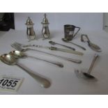 A pair of silver plate pepper and salt pots, 2 pickle forks,