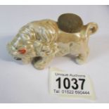 An art deco lustre ware pin cushion in the form of a bison