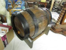 An oak wine barrel on stand