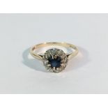 An 18ct gold and sapphire cluster ring,