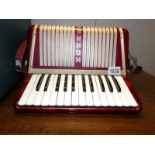 A German Hohner student piano accordion