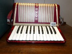 A German Hohner student piano accordion