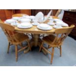 An oval extending table and 4 chairs