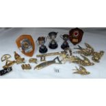 A box of brass items and trophies