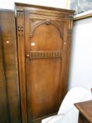 An oak hall cupboard