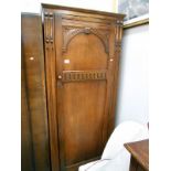 An oak hall cupboard